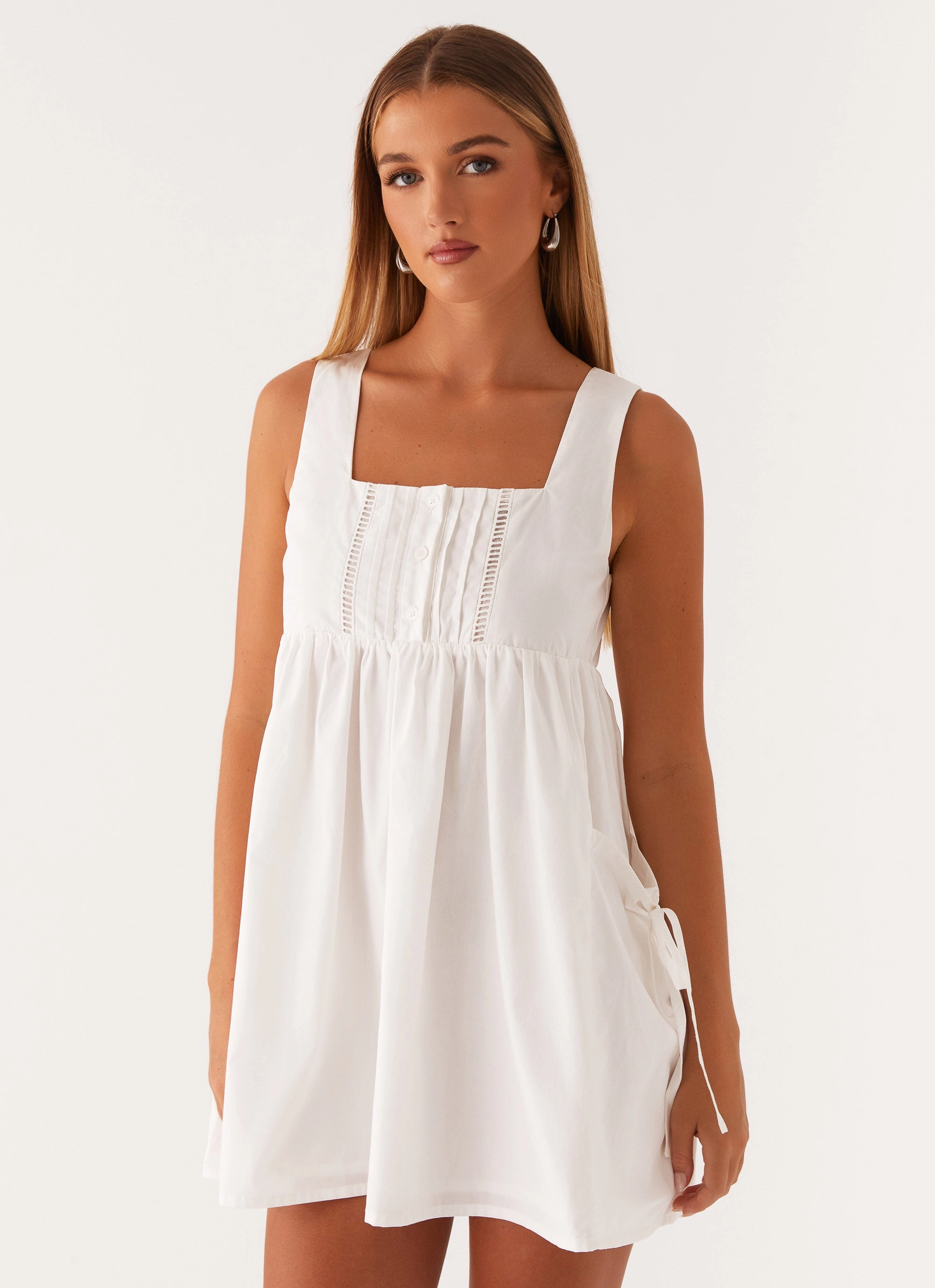 Button Accent Relaxed and Effortless Ottoline Babydoll Mini Dress - White