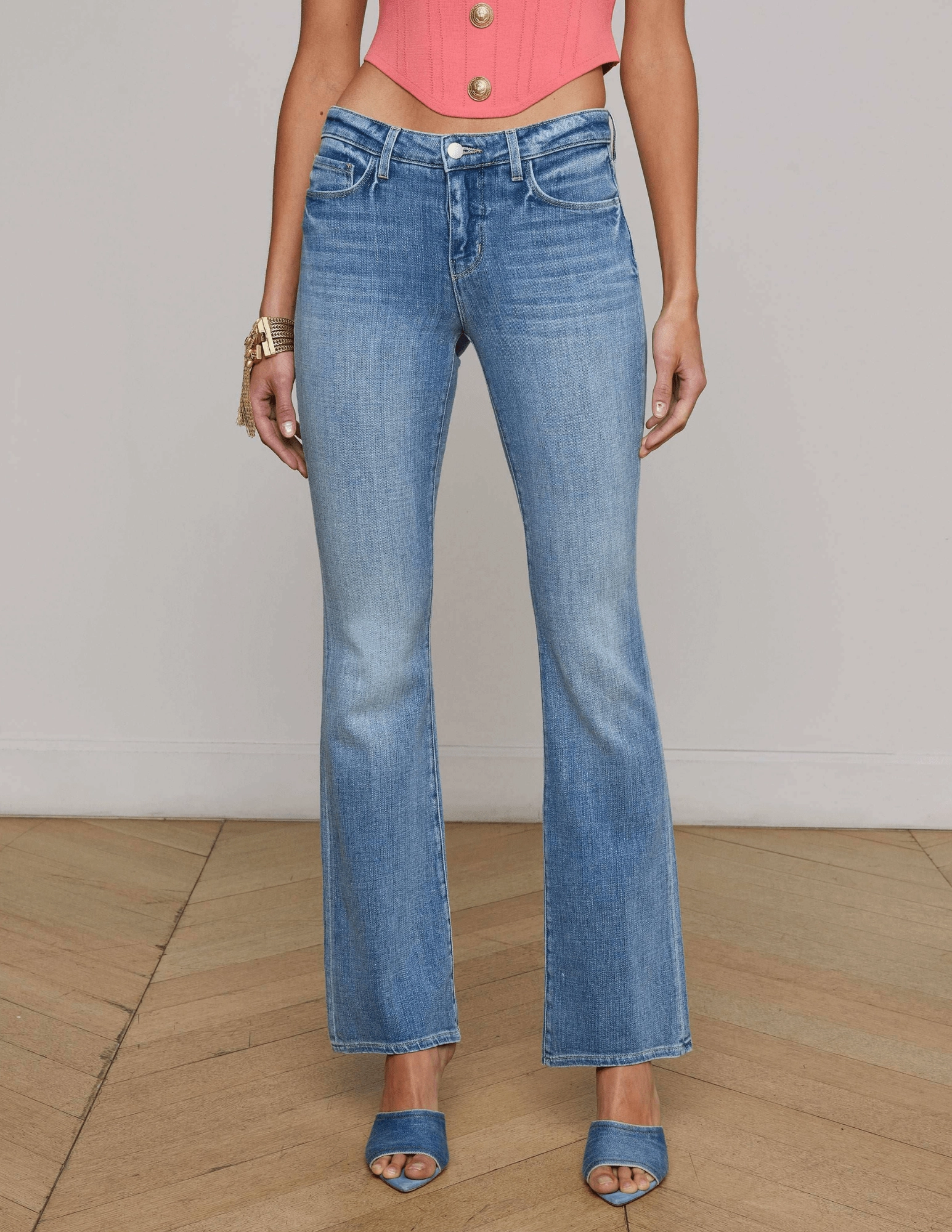 Curved Seam Construction L'AGENCE Cara Low-Rise Bootcut Jeans in Ibarra