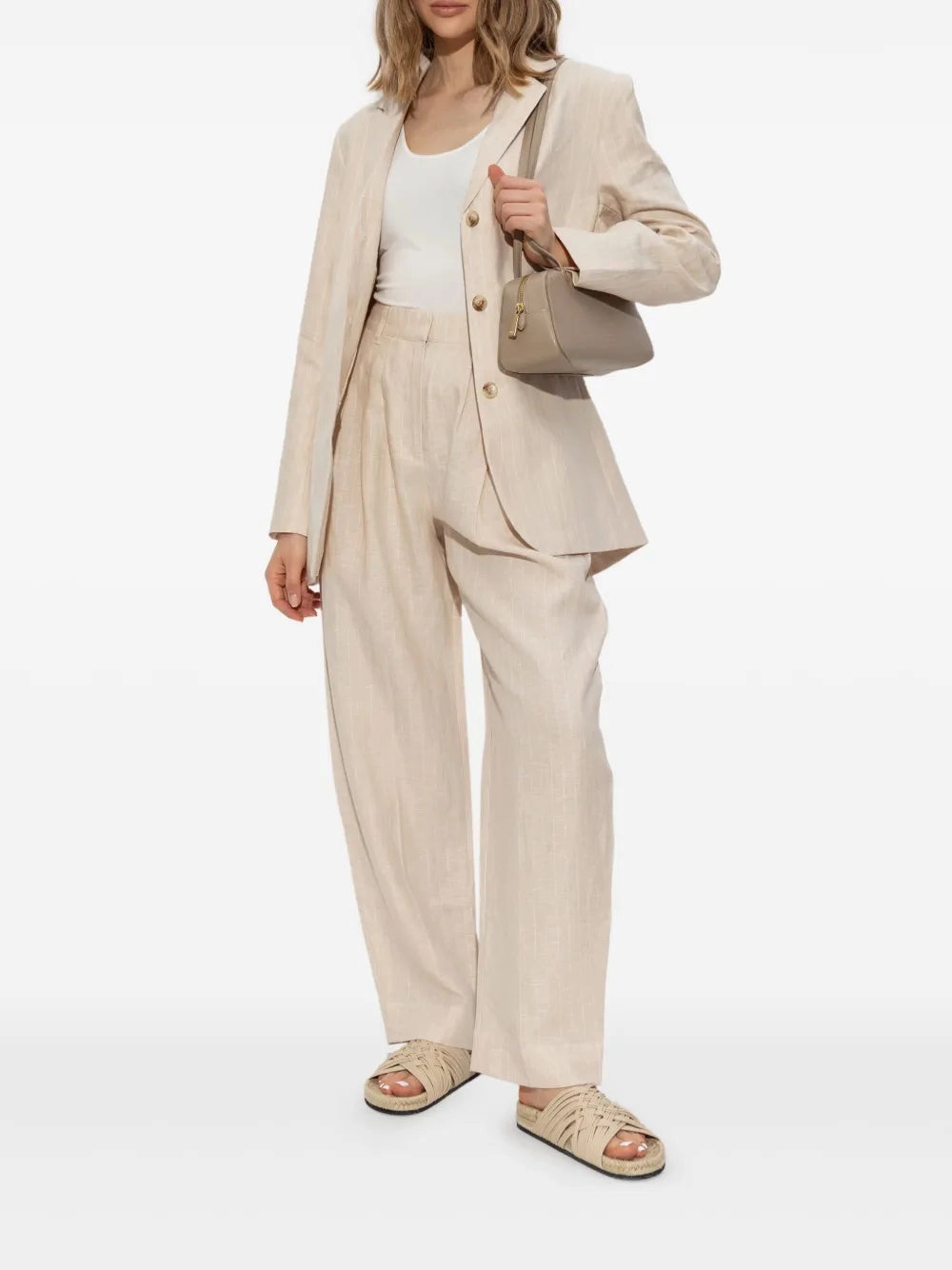 Lucille Trousers in Beige Pinstripe Rubberized grip